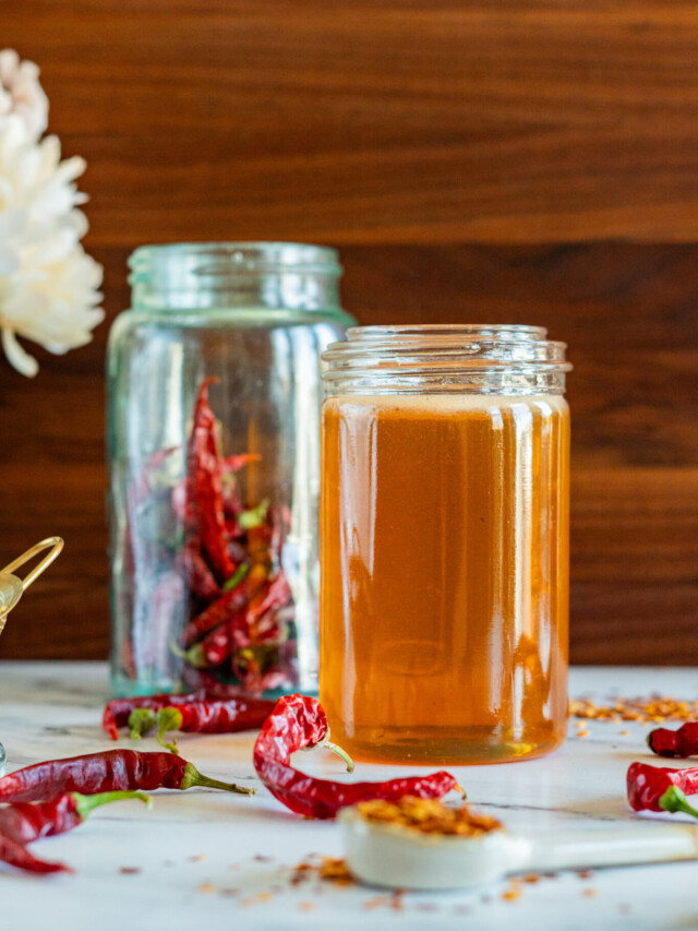 Hot honey in a mason jar.