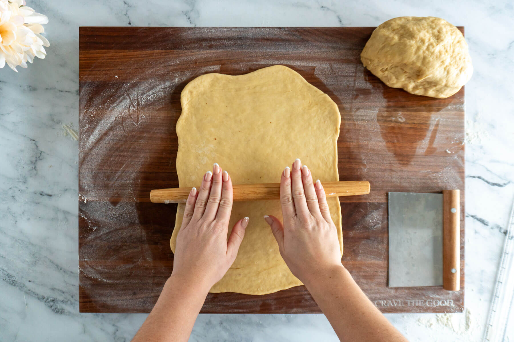 Rolling half of the dough. 