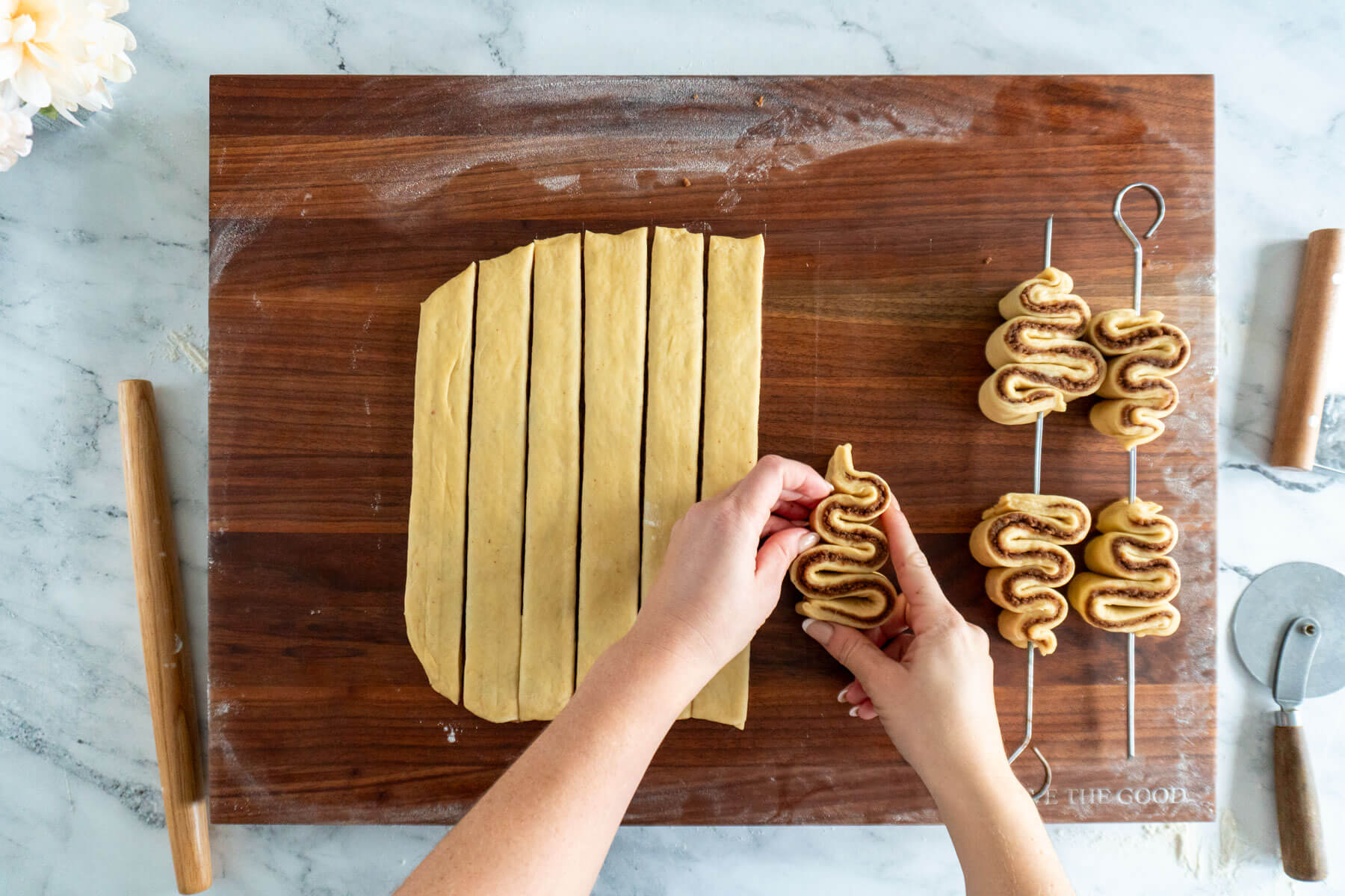 Folding the dough into Christmas trees.