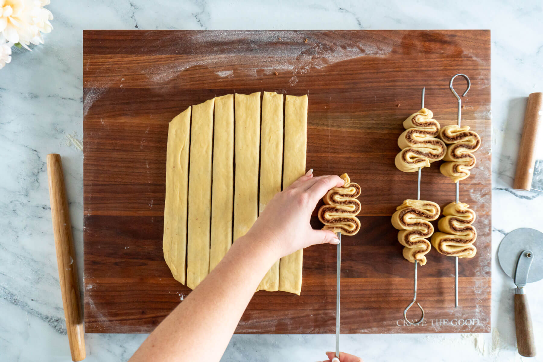 Skewering the dough trees. 