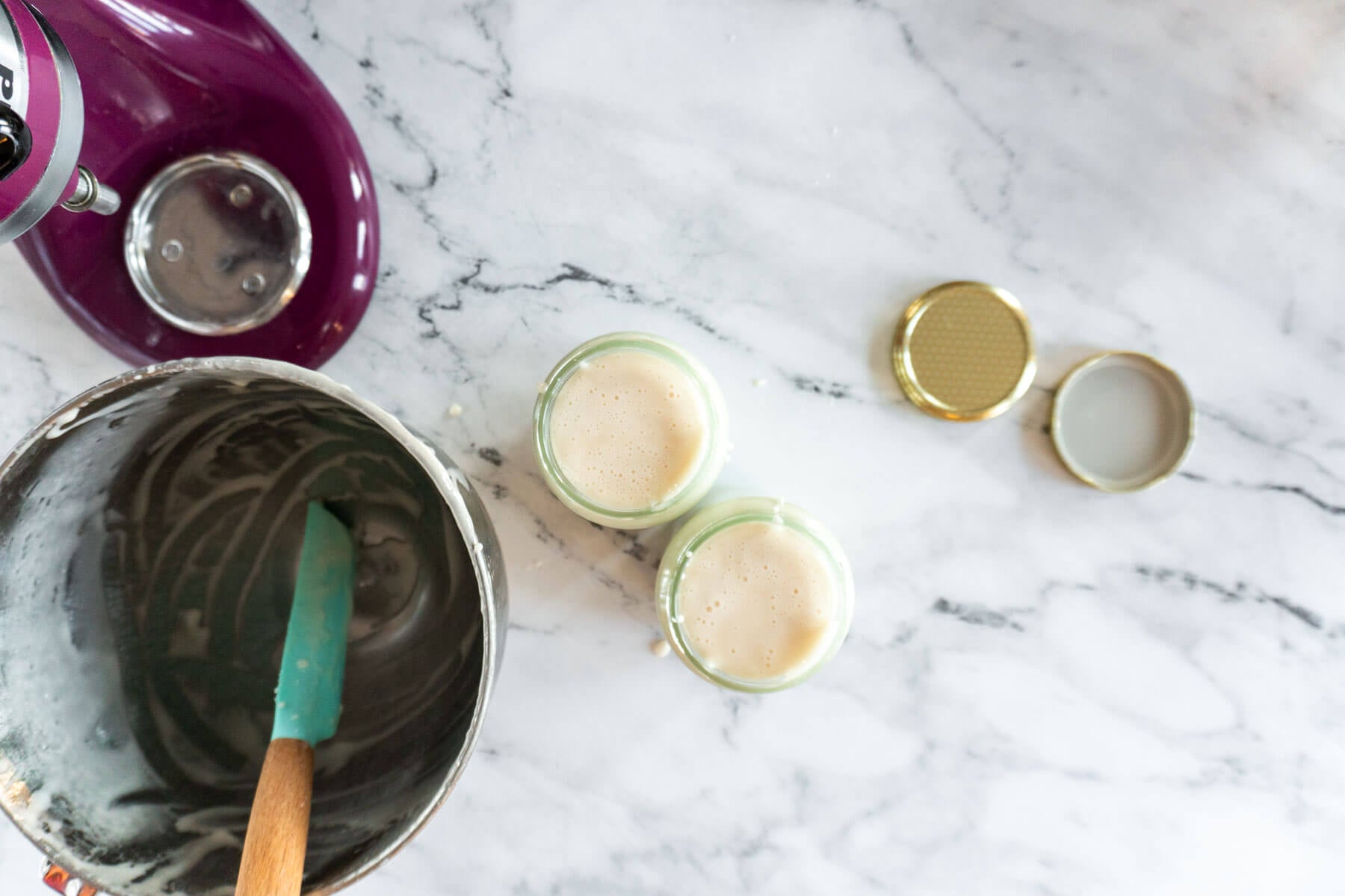 Liquid honey in glass jars. 