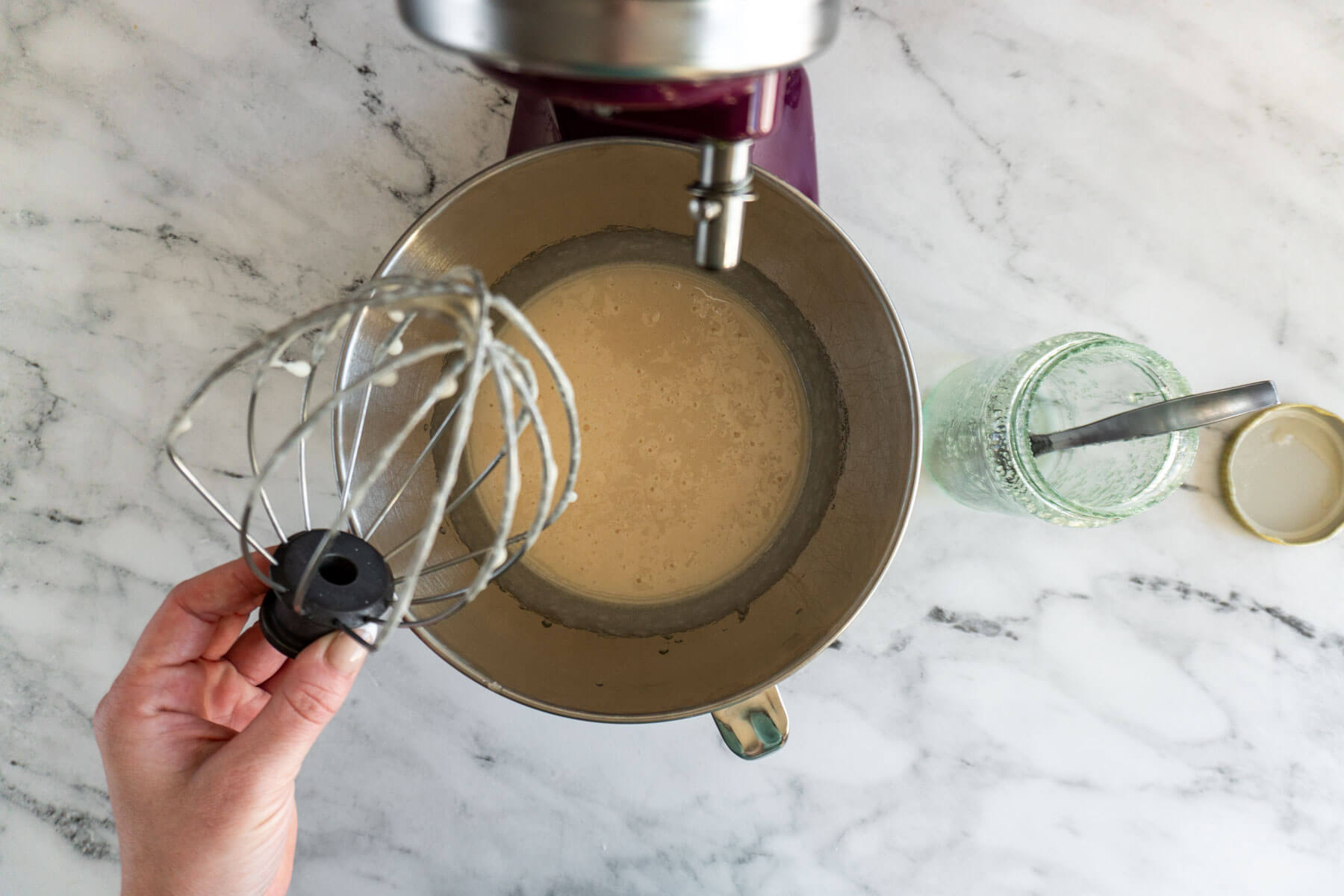 Whipped crystallized honey in mixing bowl. 