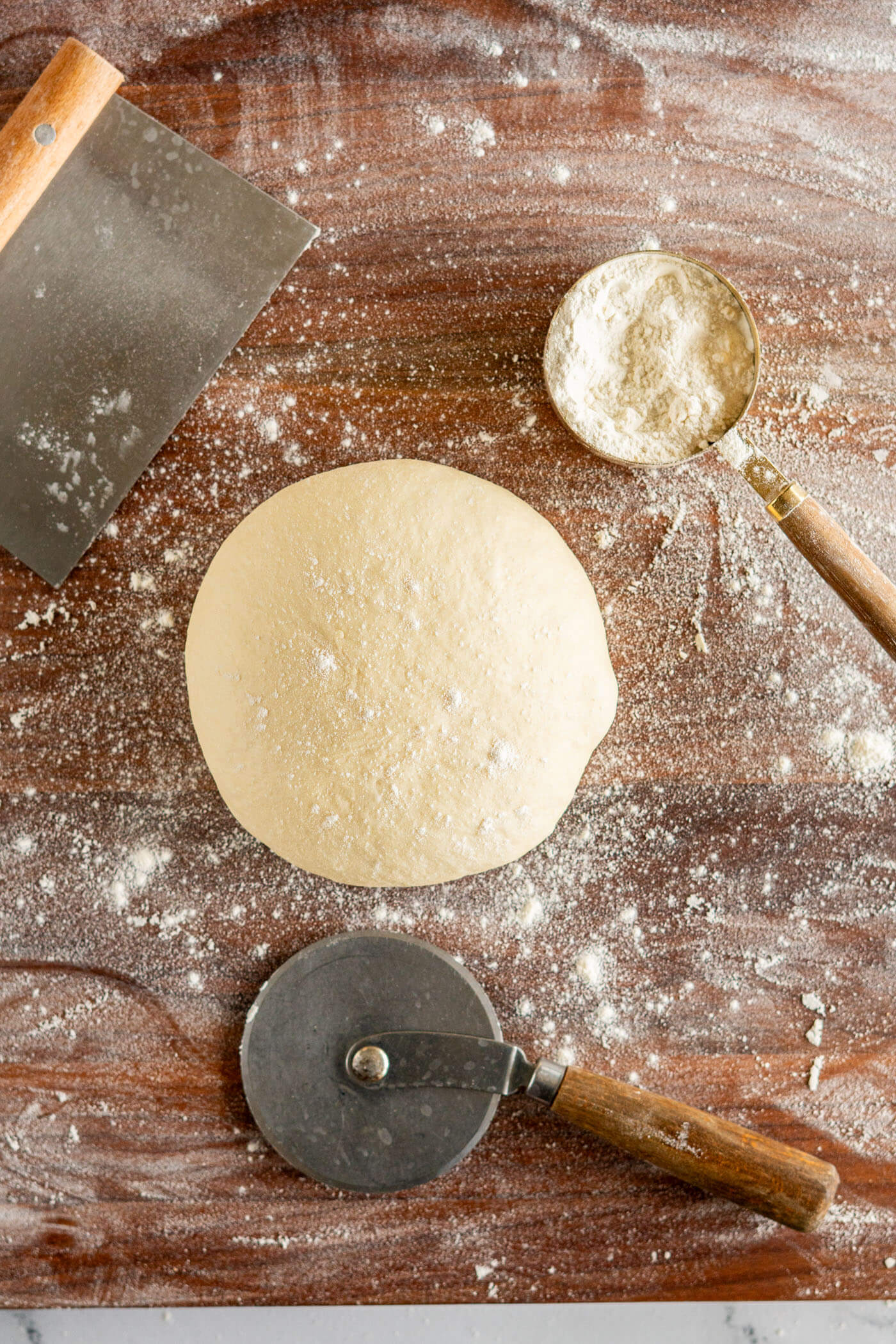 A ball of bread machine pizza dough before shaping and baking. 