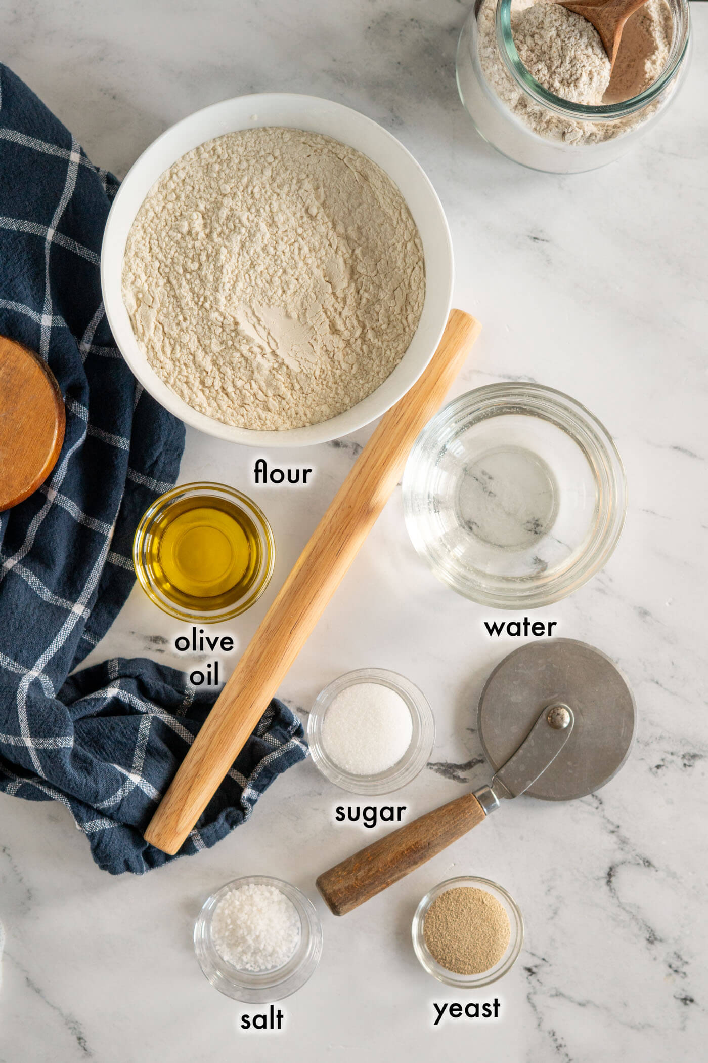 Ingredients required to make pizza dough in bread machine. 