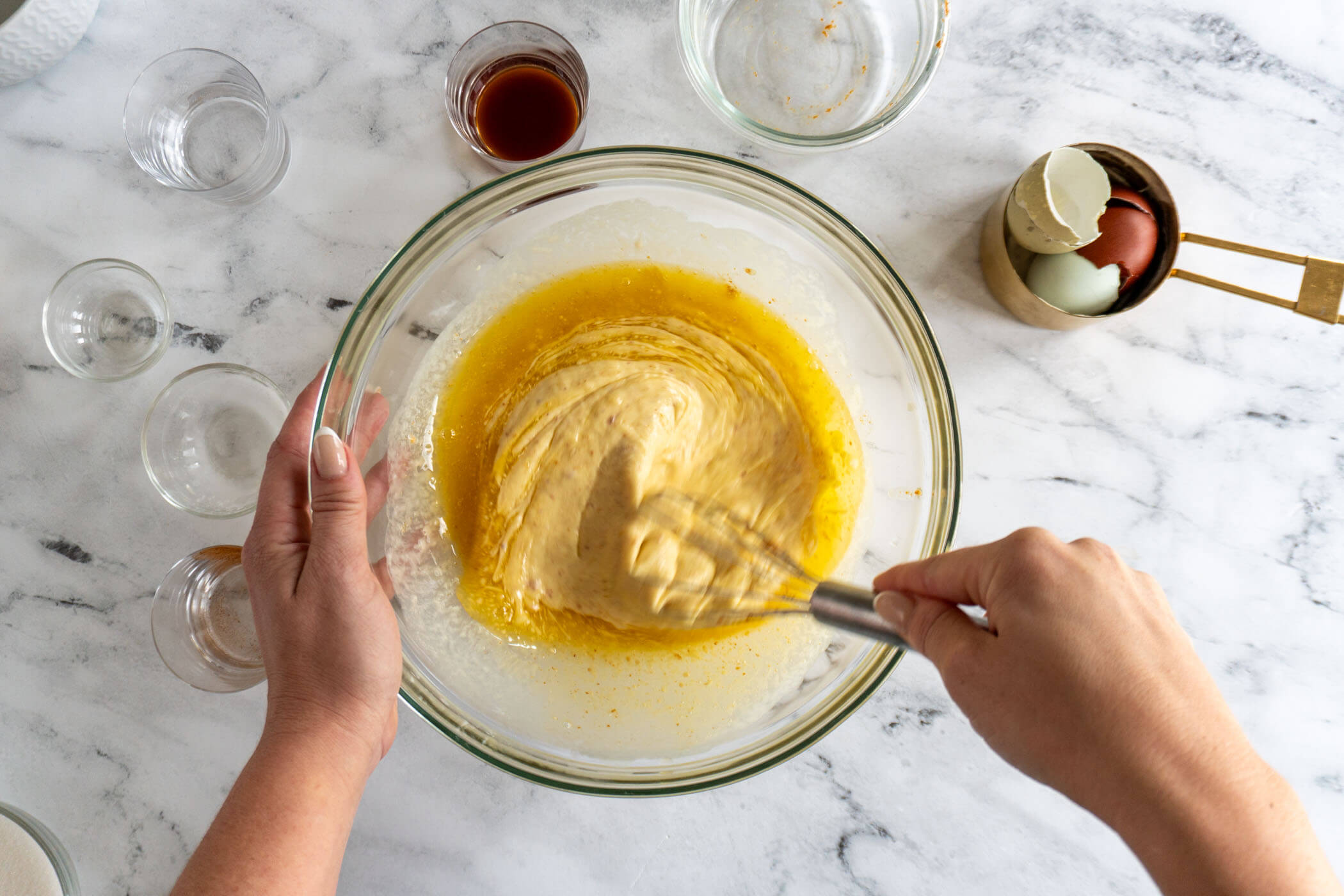 Whisking in the melted browned butter.
