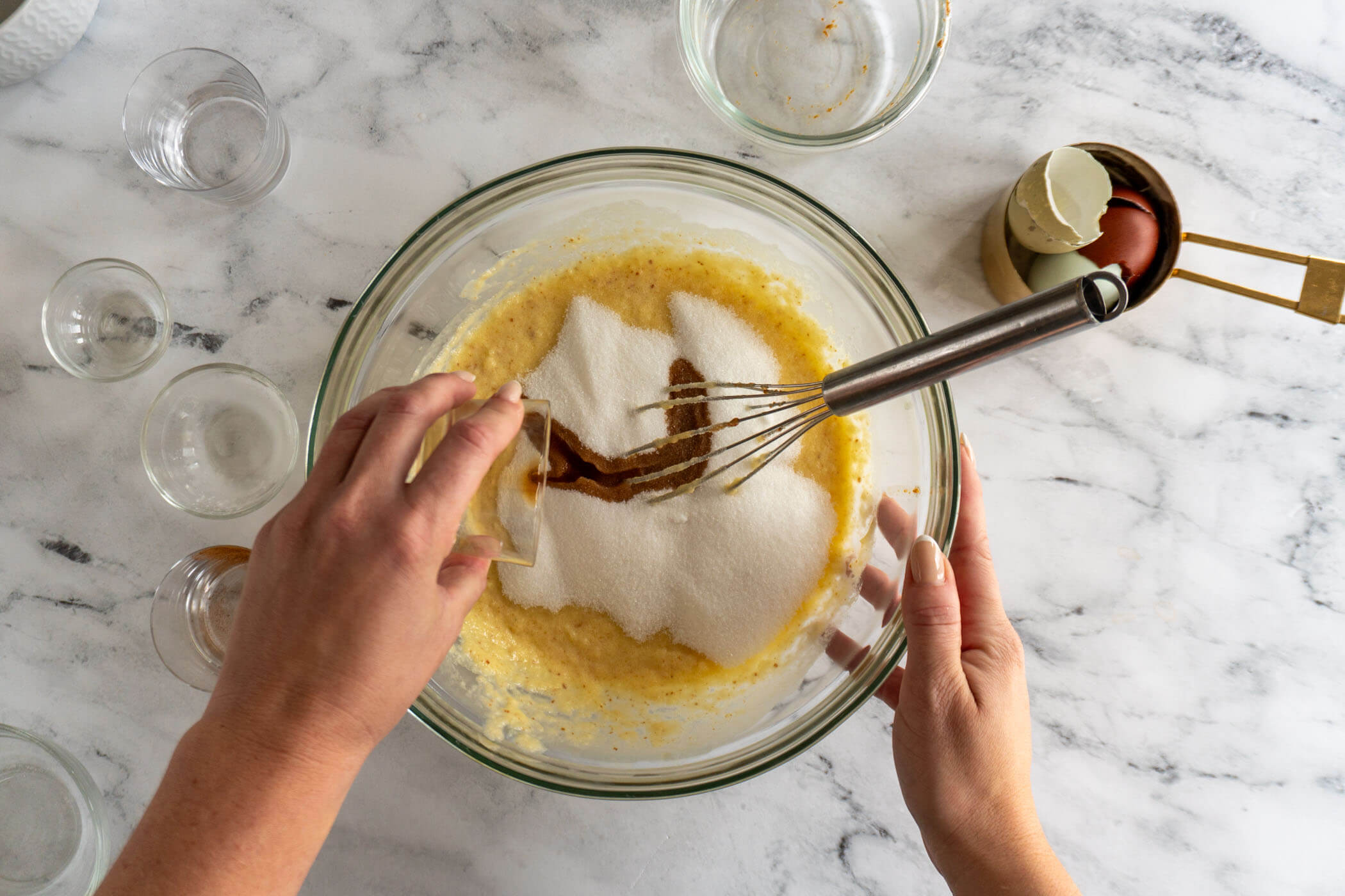 Adding sugar and vanilla. 