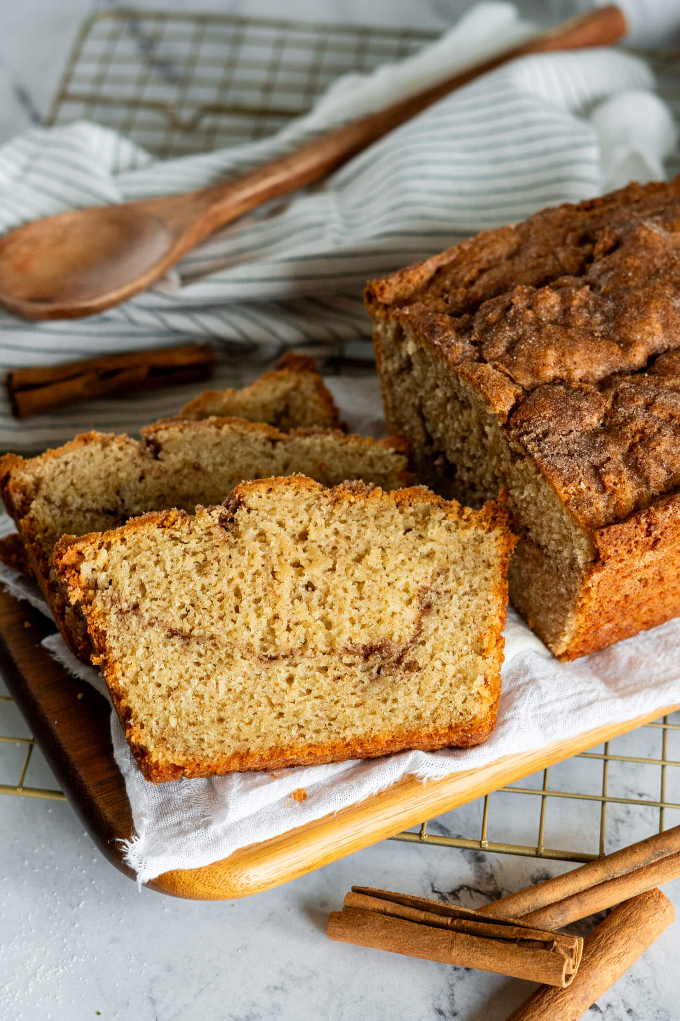 Cinnamon sugar swirled slices of sourdough discard cinnamon bread. 