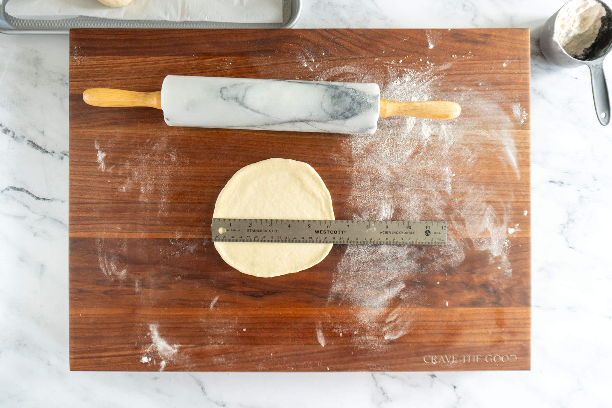 Rolling dough into a rectangle. 