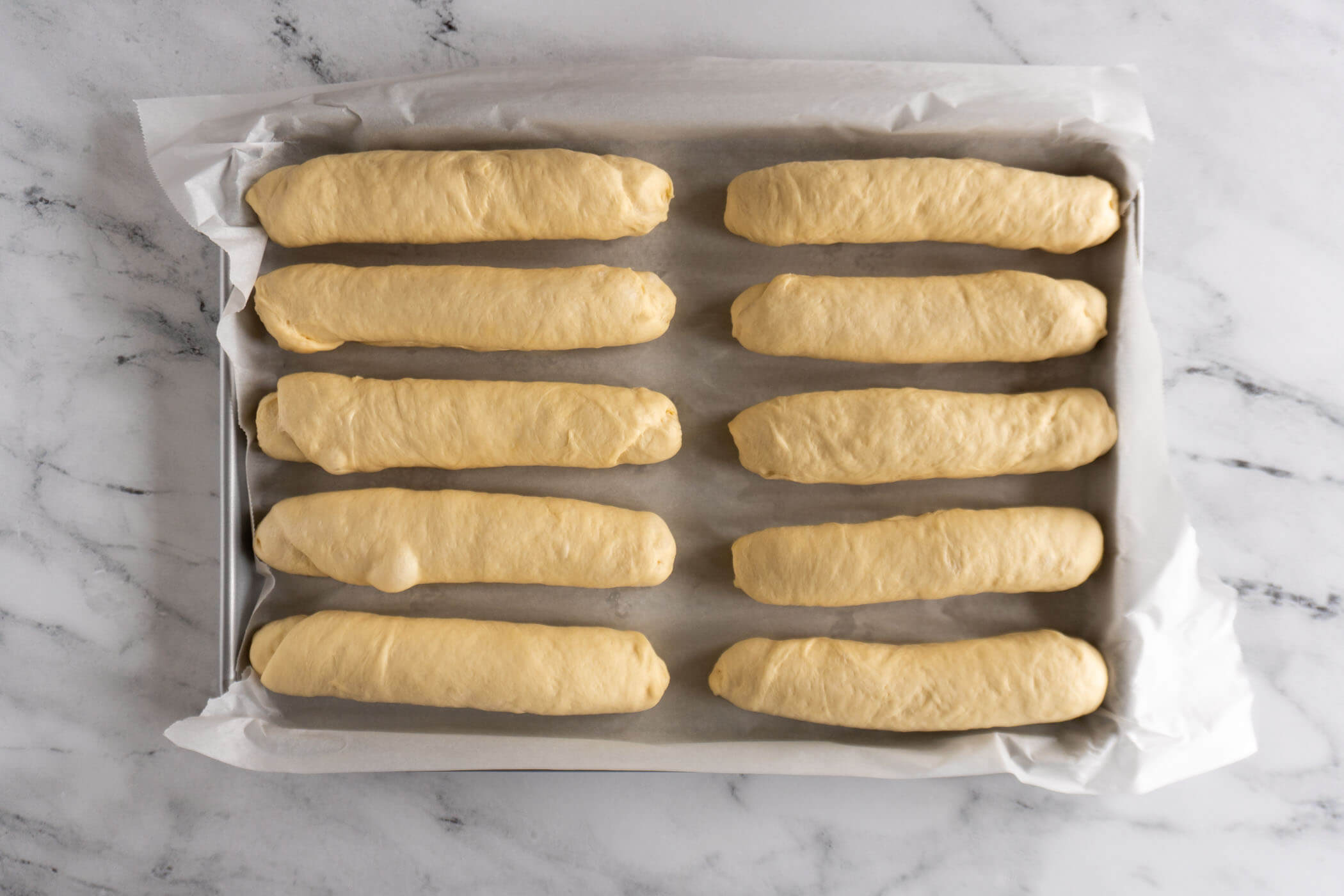 Shaped buns after proofing. 