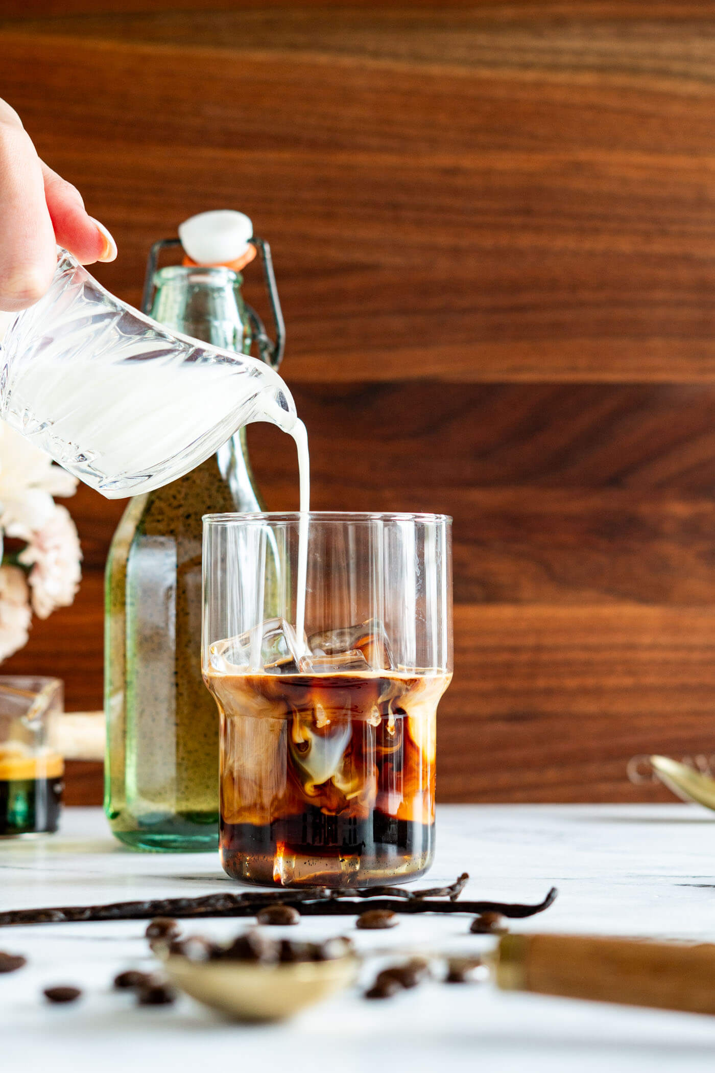 Making an iced latte with homemade vanilla latte syrup. 