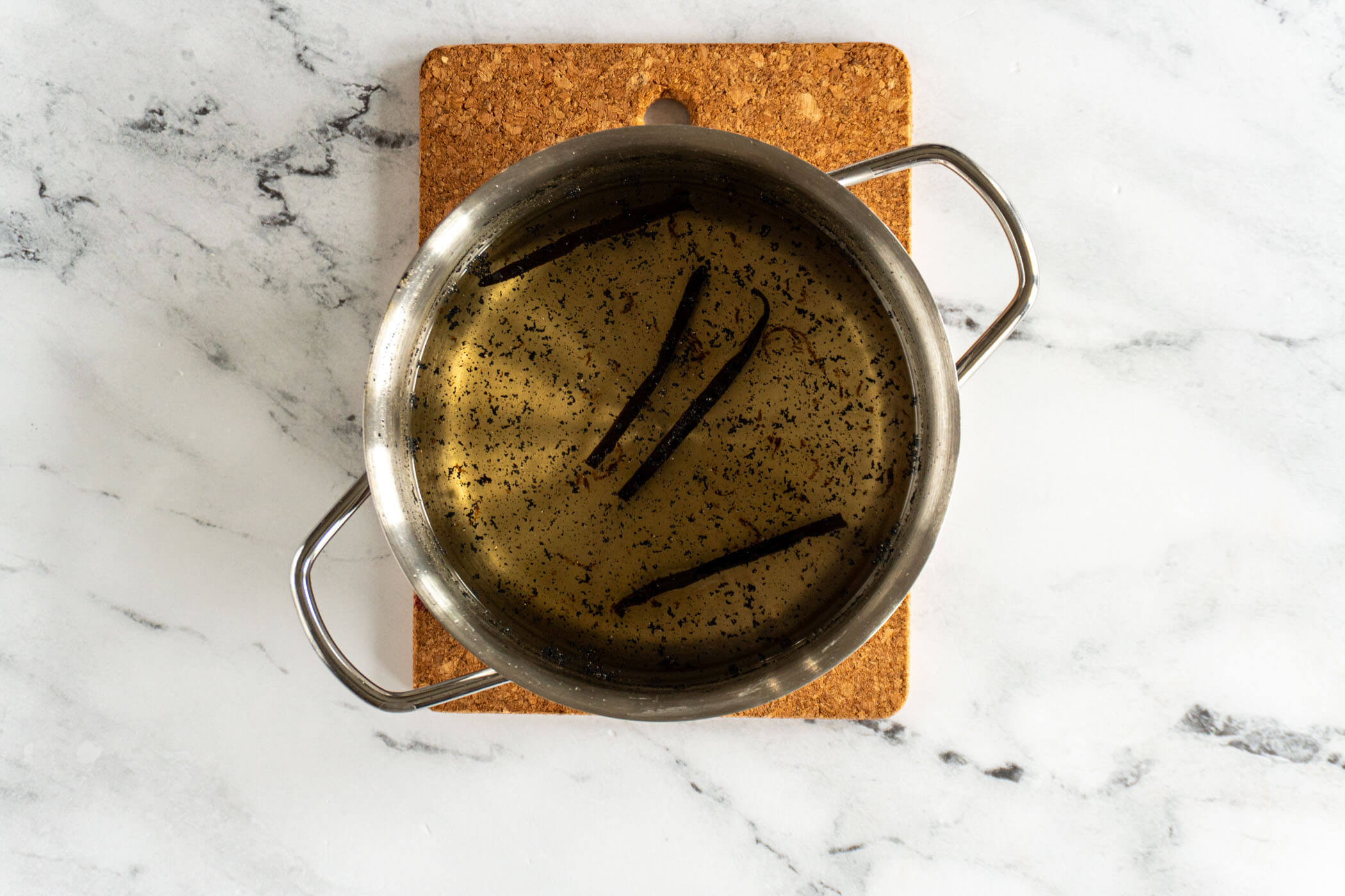 Simmered and cooled vanilla bean simple syrup in a small sauce pan. 