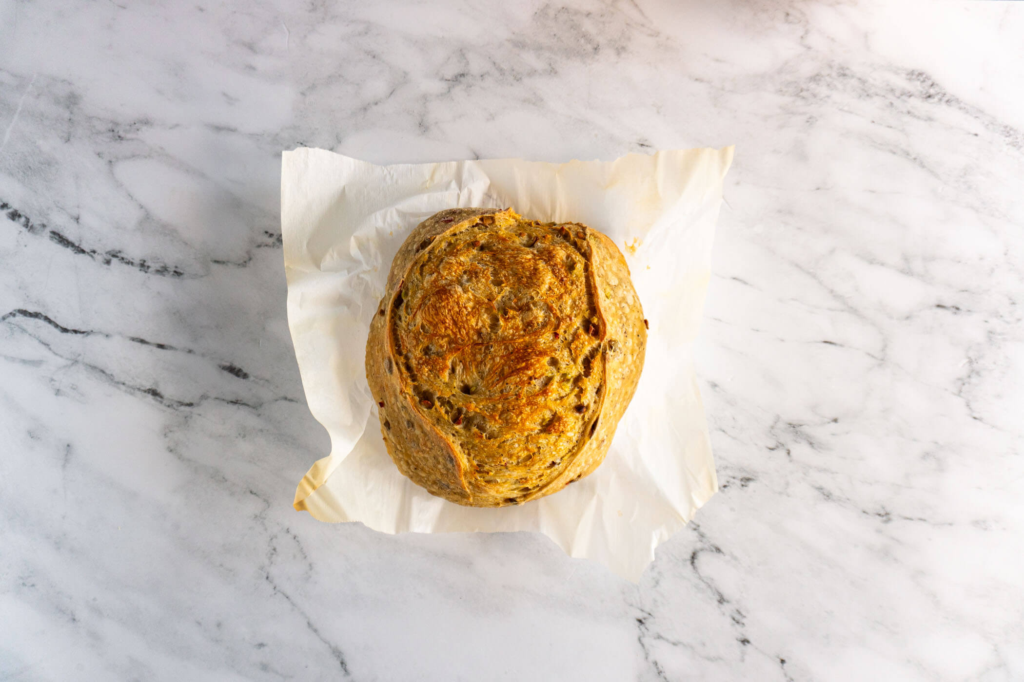 Baked sourdough olive loaf.